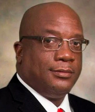 Dr. Hon. Timothy Harris